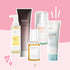 Flat lay of Korean skincare products including iUNIK Calendula Cleansing Oil, Haruharu Wonder Black Rice Cleansing Gel, Mixsoon Bean Essence, Haruharu Wonder TXA Dark Spot Serum, and iUNIK Beta-Glucan Moisture Cream, arranged on a pink background with heart and dog graphics from The Koko Collection.