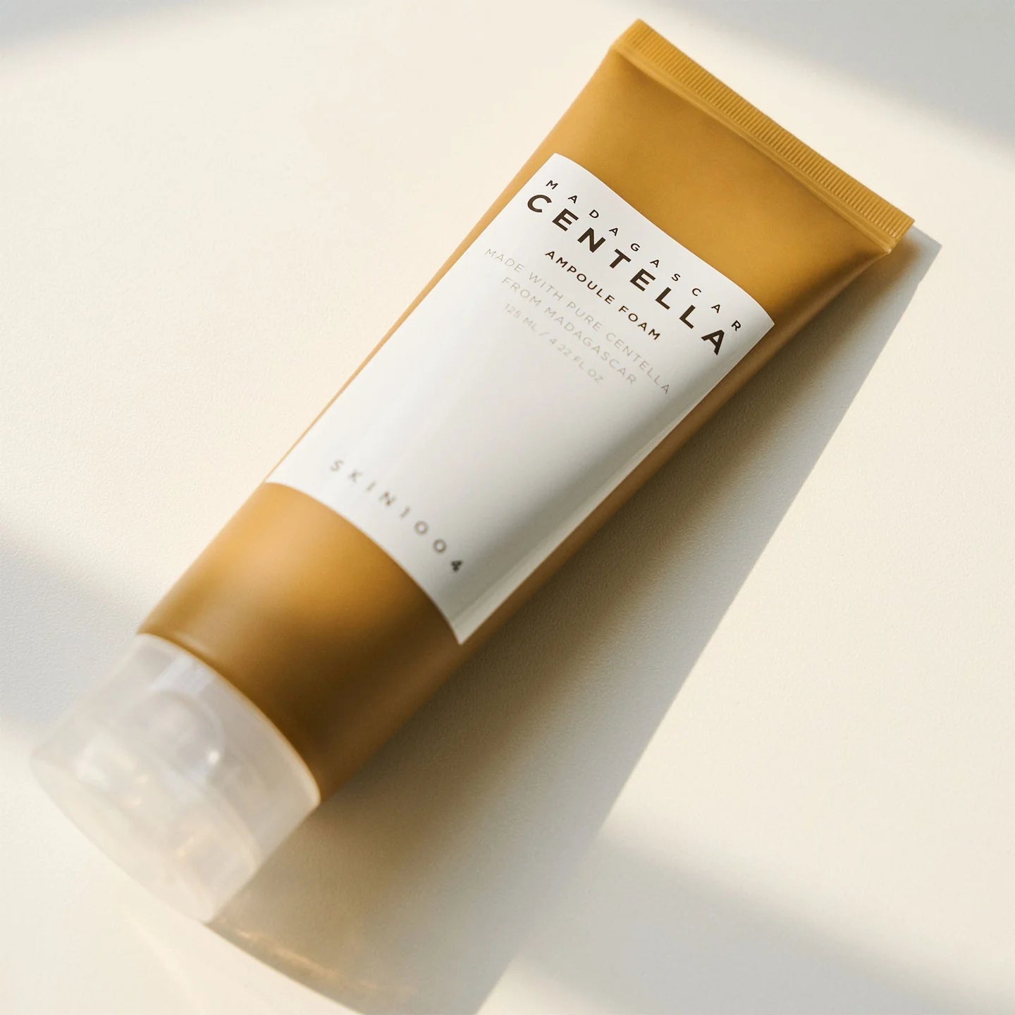 SKIN1004 Madagascar Centella Ampoule Foam cleanser on light background with soft shadows