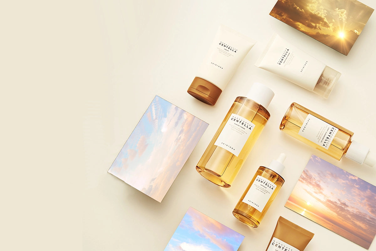 SKIN1004 products styled on beige background with soft lighting