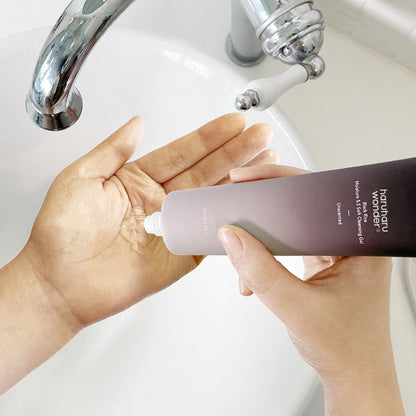 Using Haruharu Wonder Black Rice Moisture 5.5 Soft Cleansing Gel – gentle pH-balanced unscented Korean face wash being dispensed into hand over sink