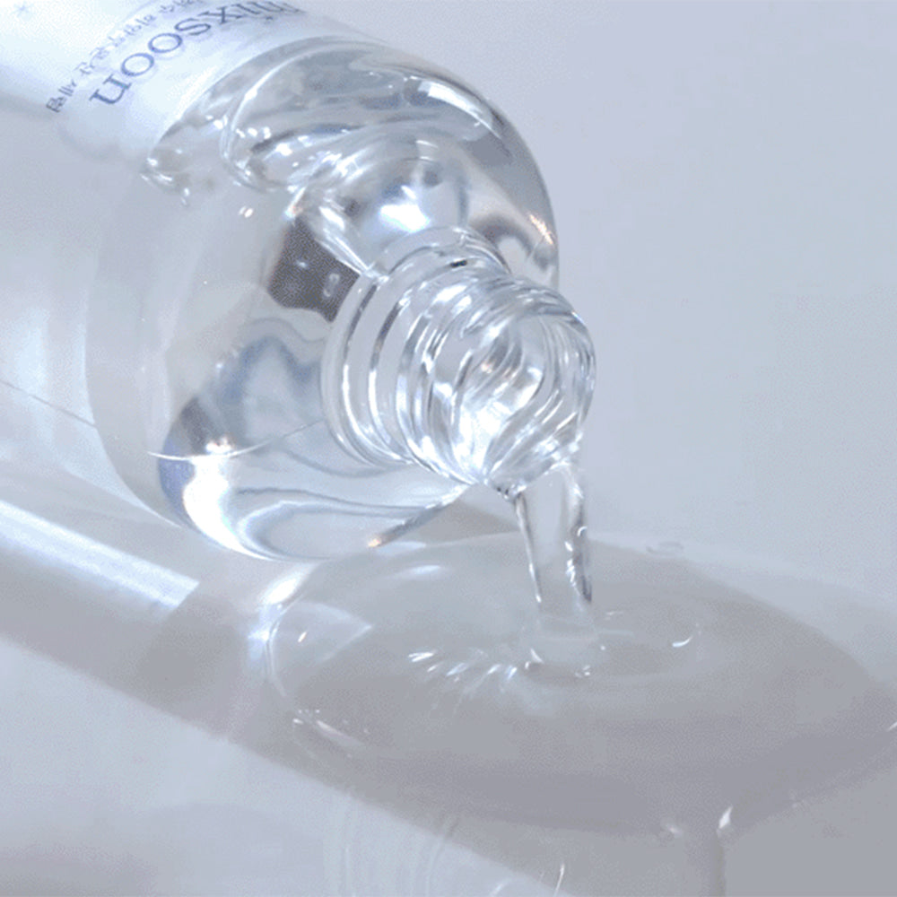 Close-up of Mixsoon Glacier Water Hyaluronic Acid Serum being poured, showing its lightweight, hydrating texture.