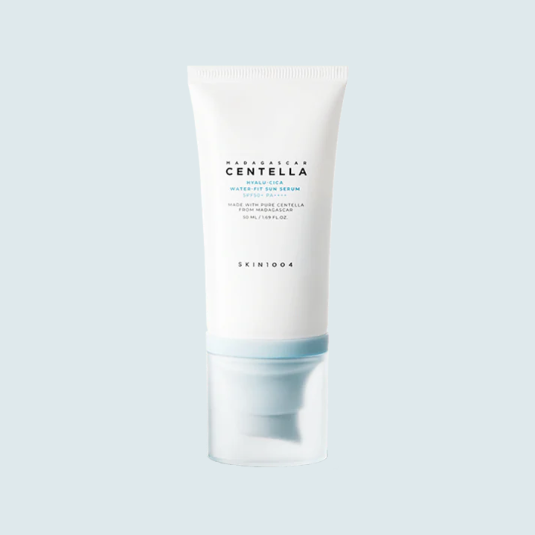 SKIN1004 Madagascar Centella Hyalu-Cica Water-Fit Sun Serum on baby blue background