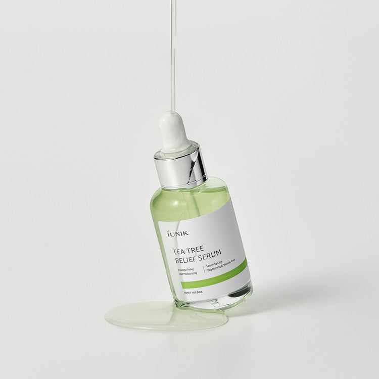 iUNIK Tea Tree Relief Serum with dropper dispensing product – calming Korean serum for acne-prone, sensitive skin.